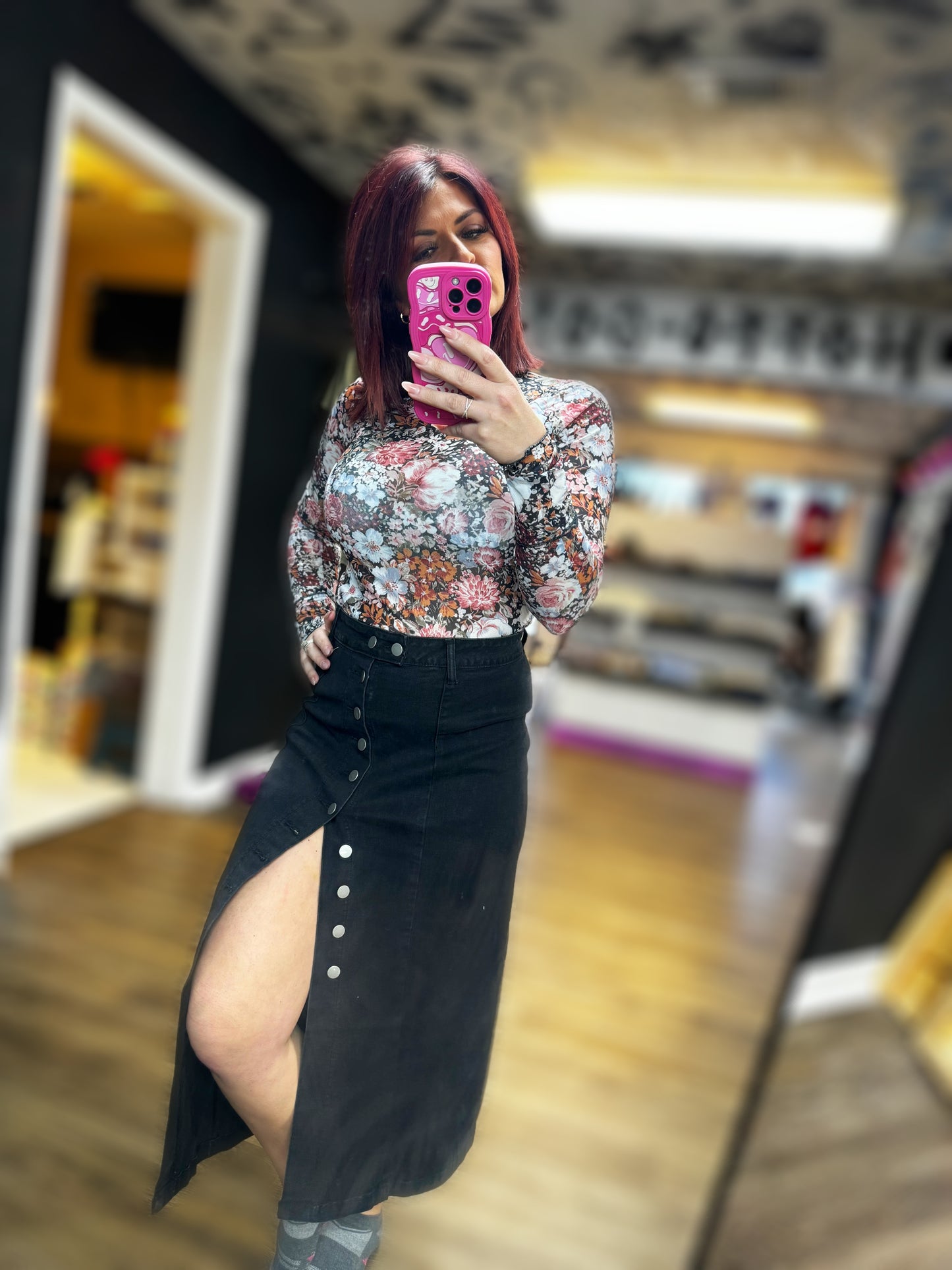 Women in Black button down skirt